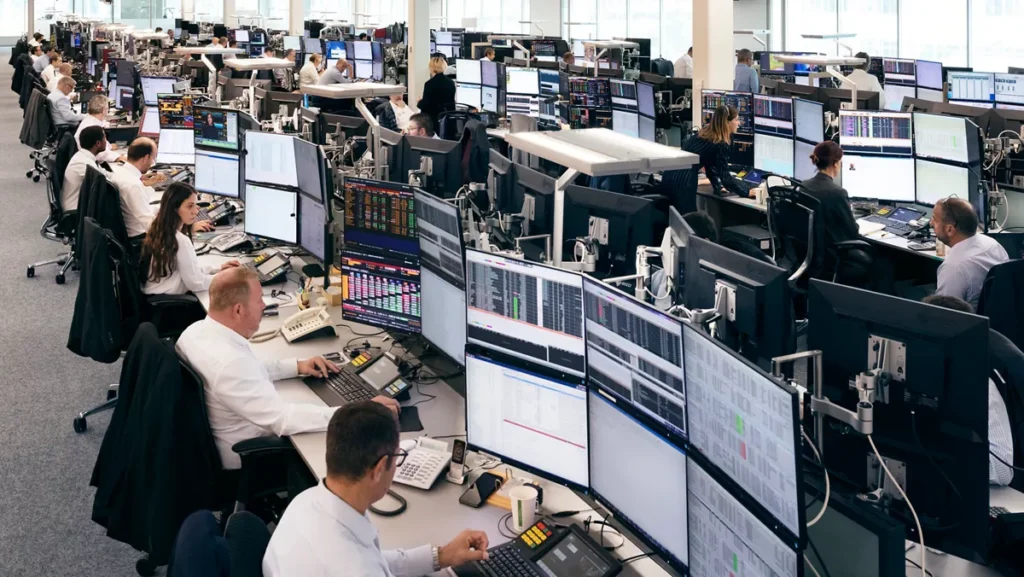| About Us GENEVA office trading floor E9A2755 04 2 image 16 9 | Hataf Capital